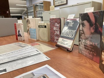 Books on display as part of the Sylvia Plath Collection in the Gannett Library.